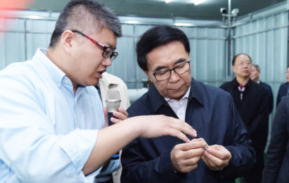 President Bai Chunli of the Chinese Academy of Sciences inspects our company's servo motor project